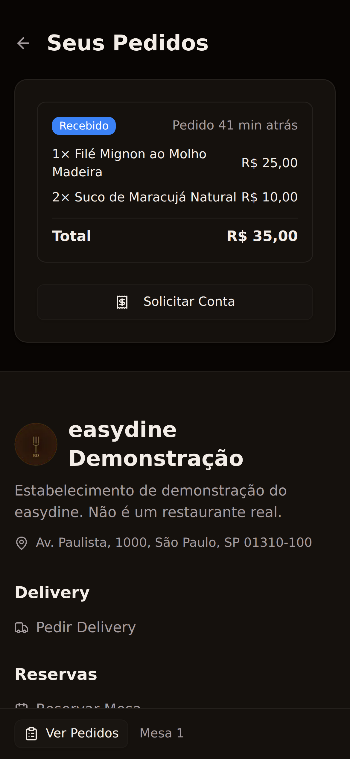 Customer's phone with the order in progress and the request-the-bill button